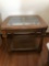 Vintage side table with wooden carved flower