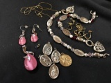 Costume jewelry and Saint pendants