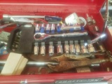 Tools in drawer: socket wrench, sockets, screwdrivers, tape measure, etc