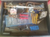 Tools in drawer:c clamps, drill bits, tape and die set, etc