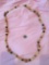CELEBRITY BRAND WOOD bead necklace approximately 3 feet long