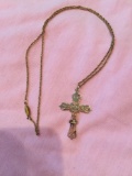 12KGF IPS JEWLERY BROOCH AND A FLORAL CROSS ONGOLD COLORED CHAIN