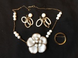 Vintage Trifari necklace, earrings and branch
