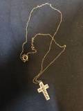 Cross on chain marked 12kt
