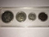 1915-S Liberty Half Dollar, 1893 Liberty Quarter, 1907 Liberty Dime, and 1883 Liberty Nickel
