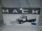 Mac first gear series r model dump truck with plow