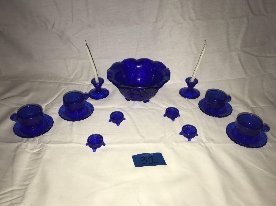 Blue glass small cup set with candleholders