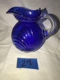 Small glass blue pitcher And 4 small glasses