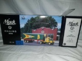 The Mack hauling series number 1:02 1960 model b61 tractor and trailer