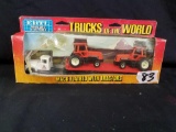 ERTL Miniatures of the world Mack Flatbed with Tractors