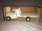 1/16th Ertl 80?s Yellow Top John Deere Dealer tilt Bed Truck