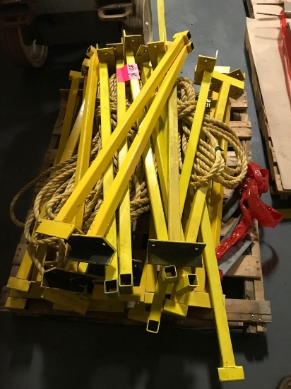Pallet of safety supports and rope
