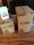 Full boxes of Coca-Cola cups lids and straws