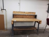 Metal and wood work bench with electrical strip