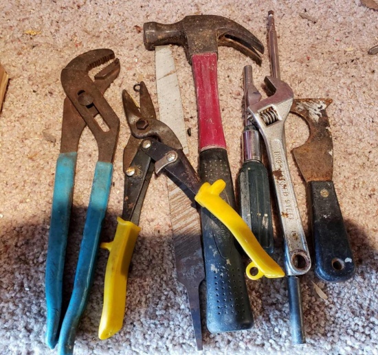Hammer, Wire snips, Channel Locks, Crescent wrench