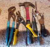 Hammer, Wire snips, Channel Locks, Crescent wrench