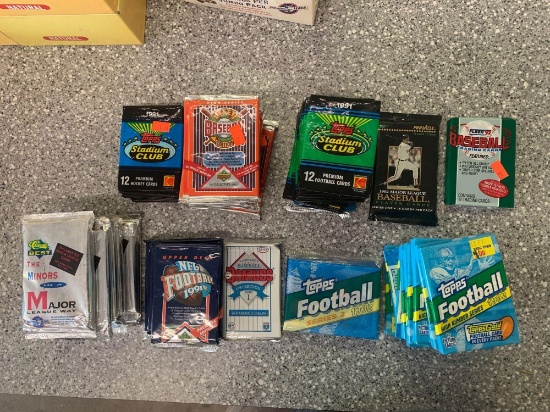 Baseball, football, hockey packs of cards unopened Approx 56