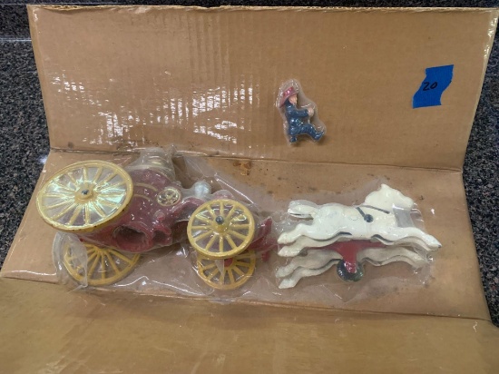 Cast Iron fire truck with horses and man unopened
