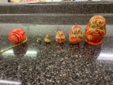 Nesting Dolls and wooden painted Egg