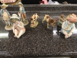 Porcelain dogs and dolls