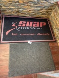 Snap fitness rug and smaller rug