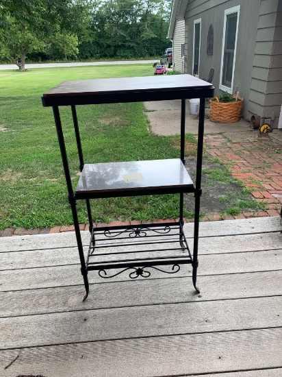 Wrought iron stand with wooden shelves