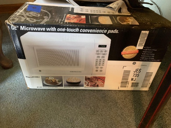 New GE microwave never been used