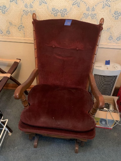 Antique padded gliding chair