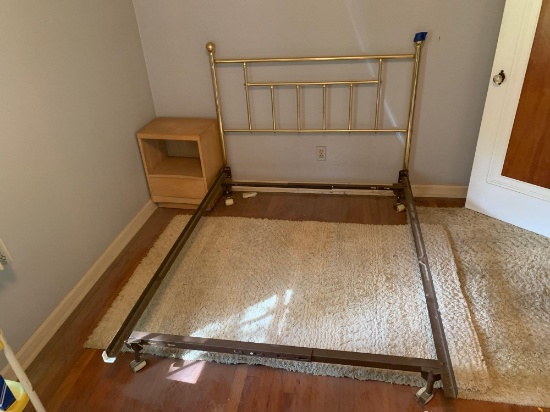 Brass bed and frame with bedside table and rugs