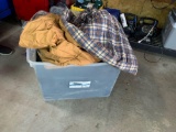 Tote full of sleeping bags and sleeping gear