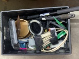 Heavy duty tote with light ice scrapers paint brushes electrical supplies brackets plus
