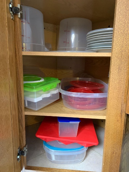 Cabinet full with reusable storage containers plates deviled egg container plus