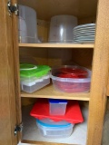 Cabinet full with reusable storage containers plates deviled egg container plus