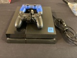 PlayStation 4 with 2 controllers, loaded with forte nite