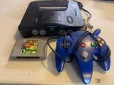 Nintendo 64 video game system with power cords one remote in super Mario 64