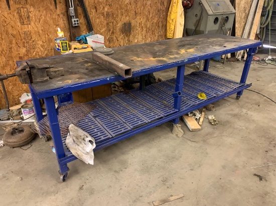 approx 8ft Heavy duty Metal table on casters with vice