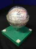 ball with autographs including Lou Brock and appears to be Ozzie Smith