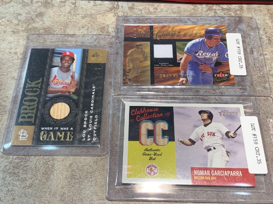 Nomar Garciaparra, George Brett, and Lou Brock jersey card and game used baseball bat cards