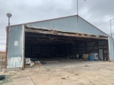 Lester Hanger 55x70x13.5 no hanger door building that is north and west on property and all contents