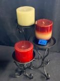Three Wrought Iron Candle Stands and Candles