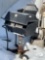 Two matching grills charcoal gas grills