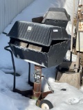 Two matching grills charcoal gas grills