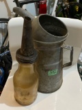 Two Vintage Oil Containers