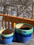 Two matching flower pots and a plant stand