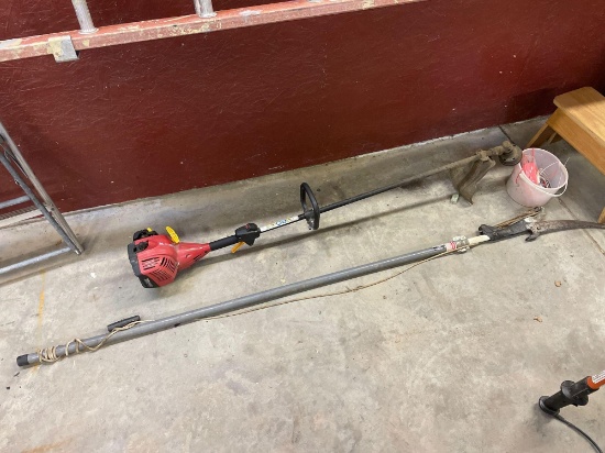Homelite string trimmer with extra string and pole saw