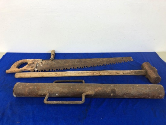 Hand saw, steel post pounder, sledge hammer