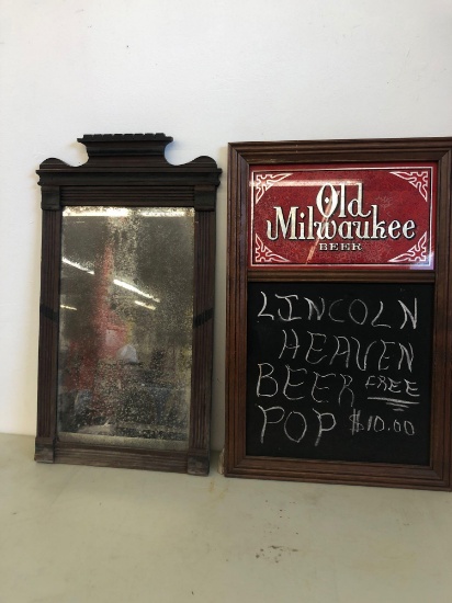 Mirror and Old Milwaukee Beer board