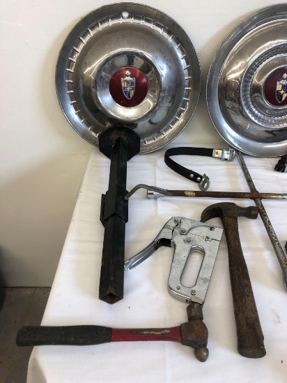 Hub cap covers tools plus