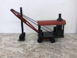 Black and red vintage excavator