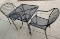 Rod iron table with two chairs